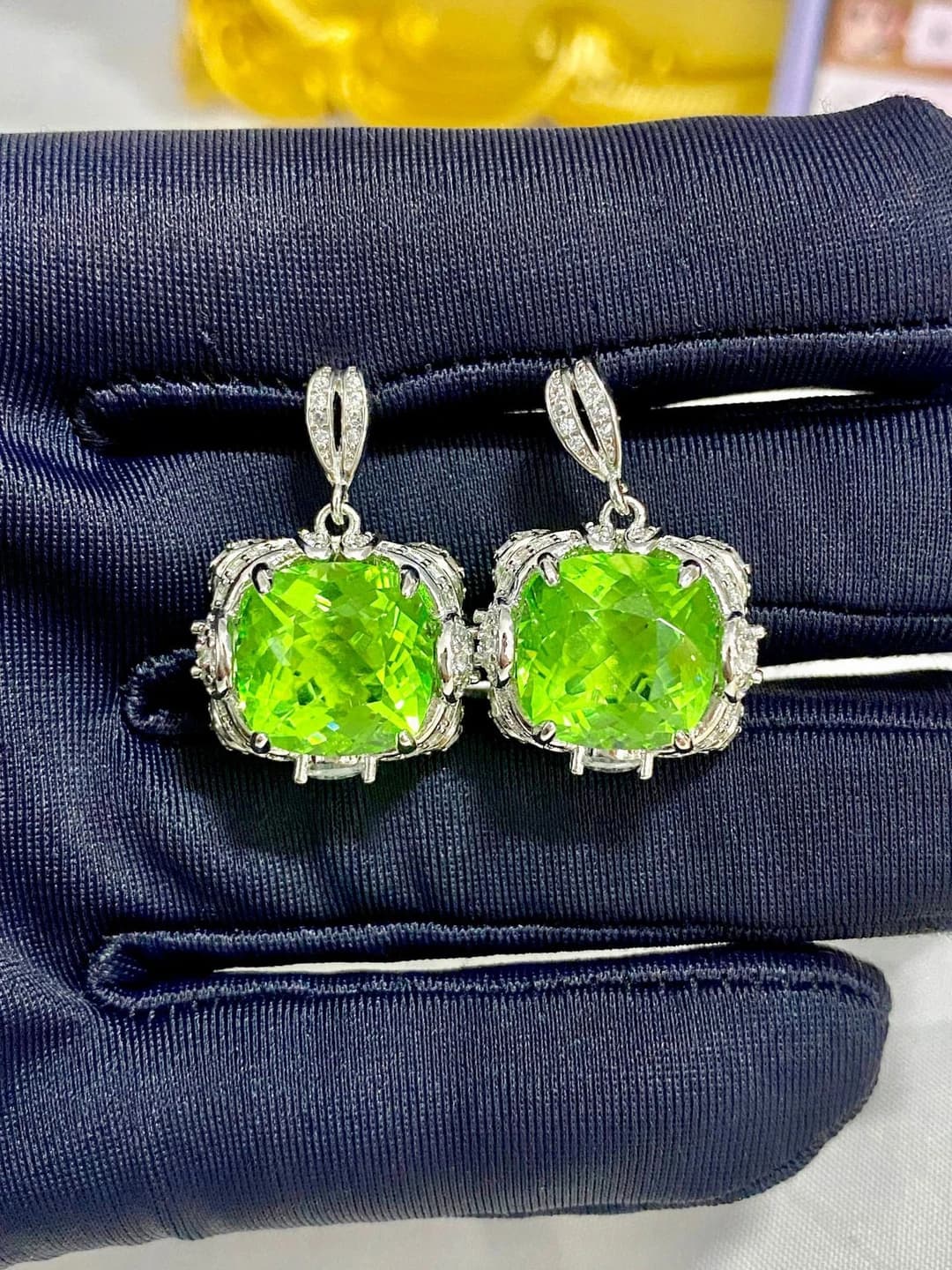 Emerald green diamond studs (pair)