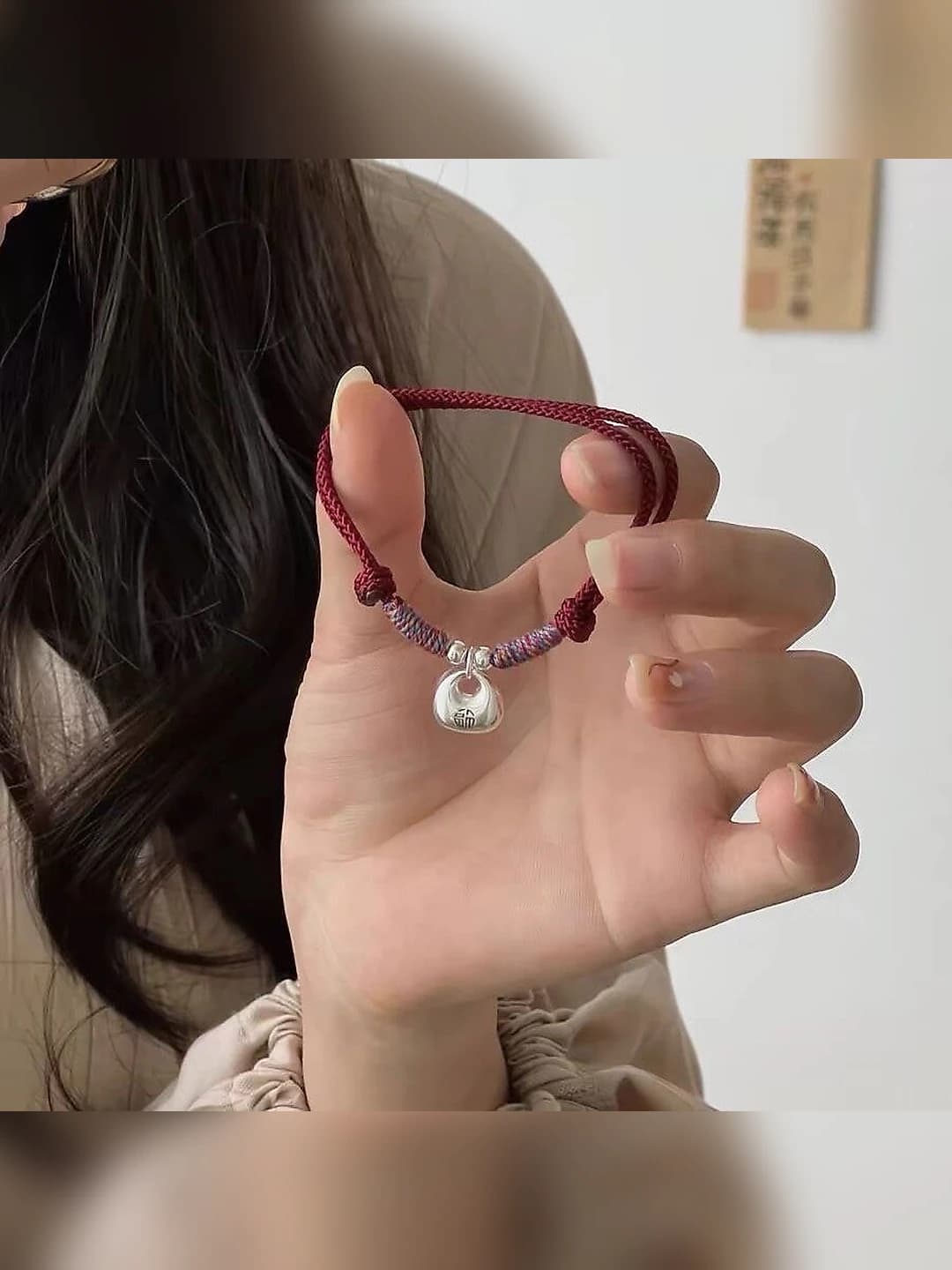M808 Red string bracelet