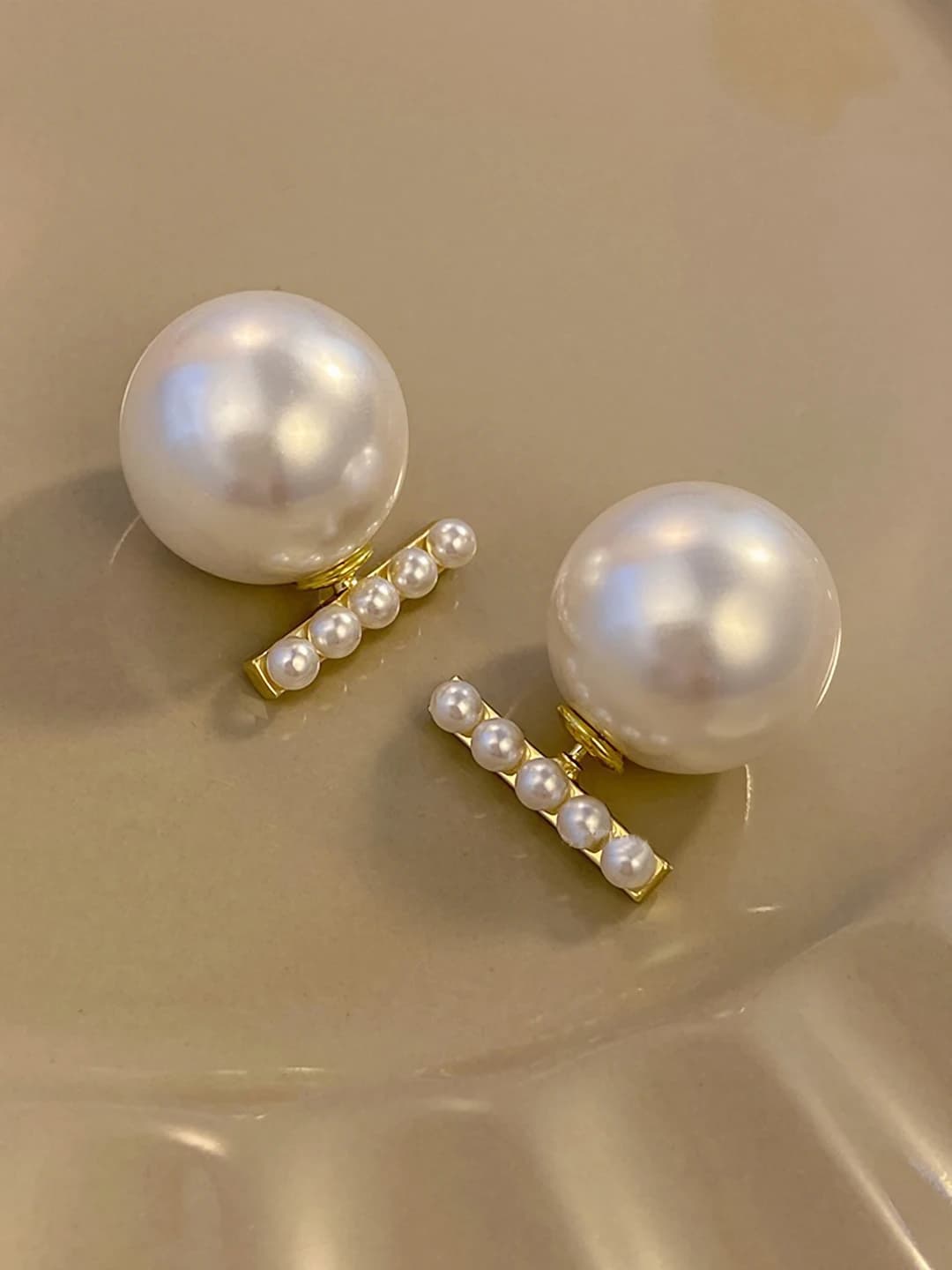 Elegant faux pearl studs