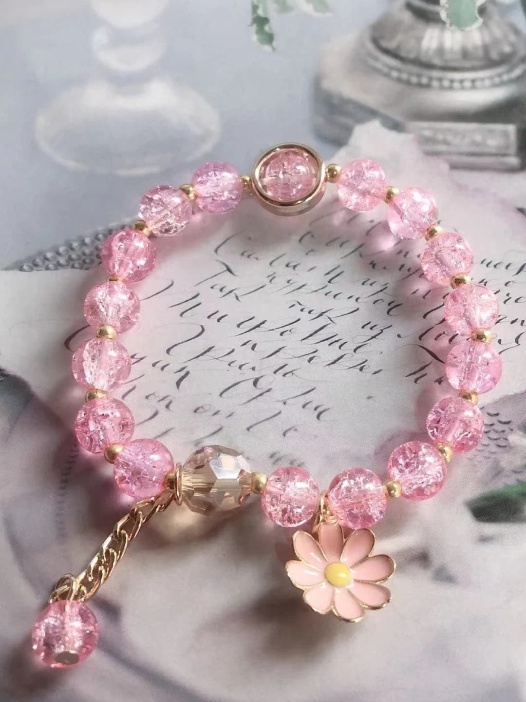 Women's handmade glass bracelet with small daisy print in a natural style
