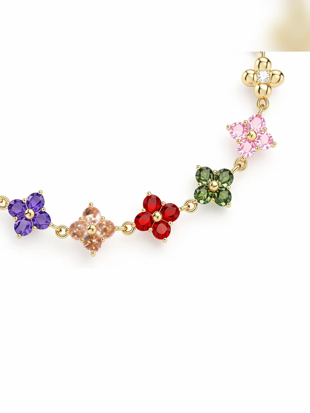 Women's jewelry with colorful four-leaf clover gemstones in light luxury style