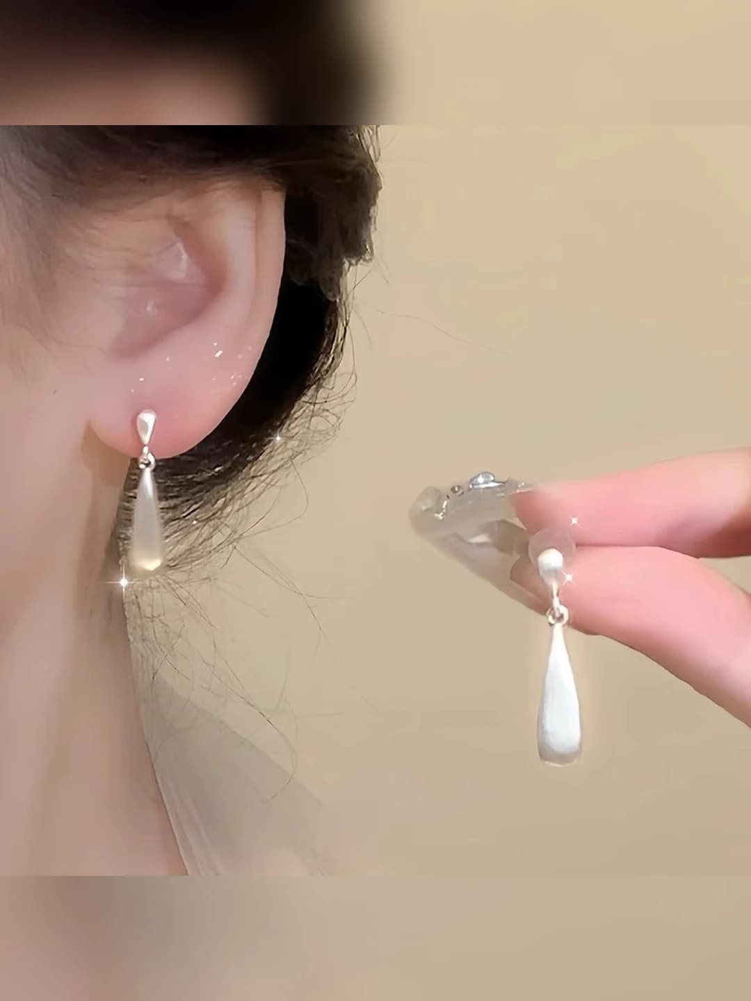 Women's retro matte silver teardrop earrings with polka dot design