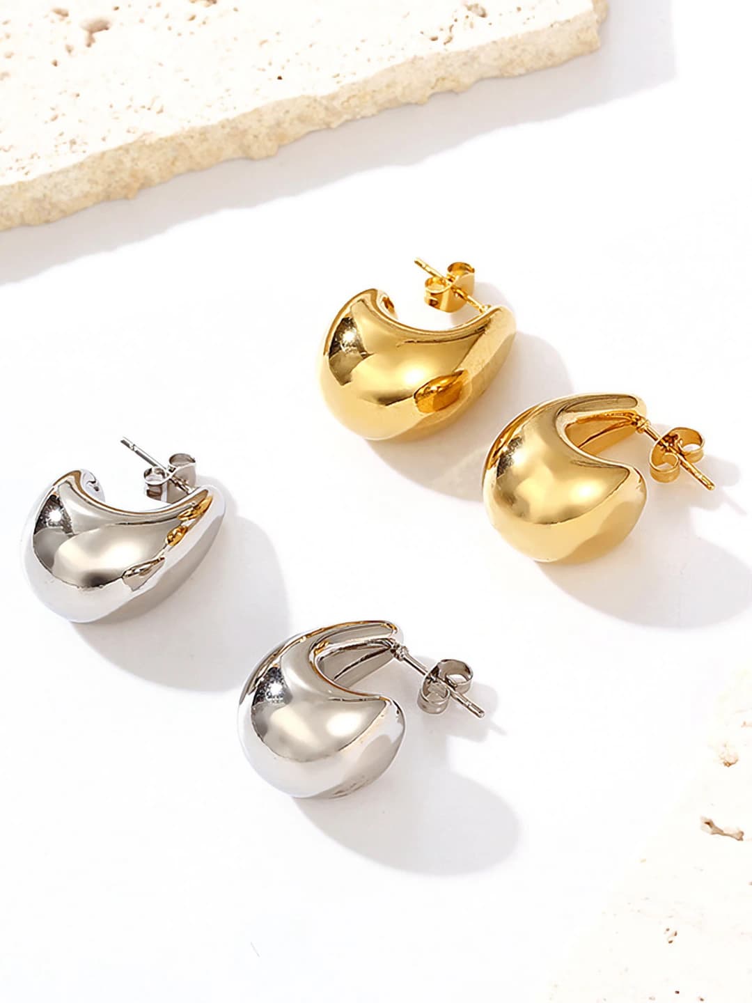 Women's retro hollow stainless steel hoop earrings with 18K gold plating, semi-circular shape