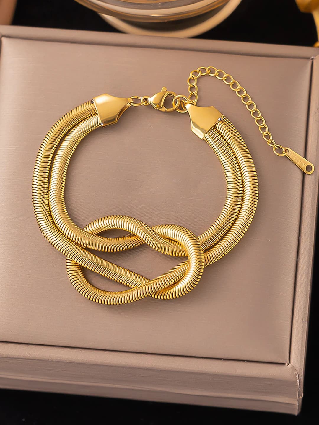 SLE77, snake bone, gold