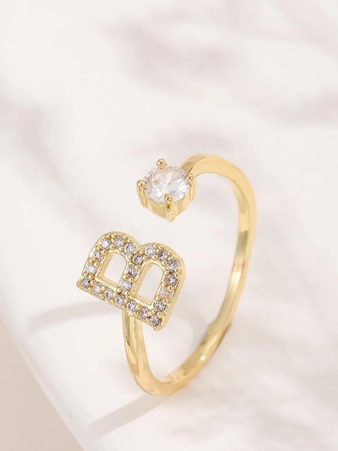 Gold letter B