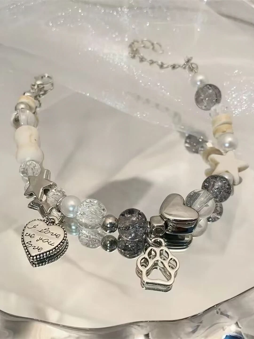 Women's handmade mixed material bracelet with stars, claws and bones, 2026