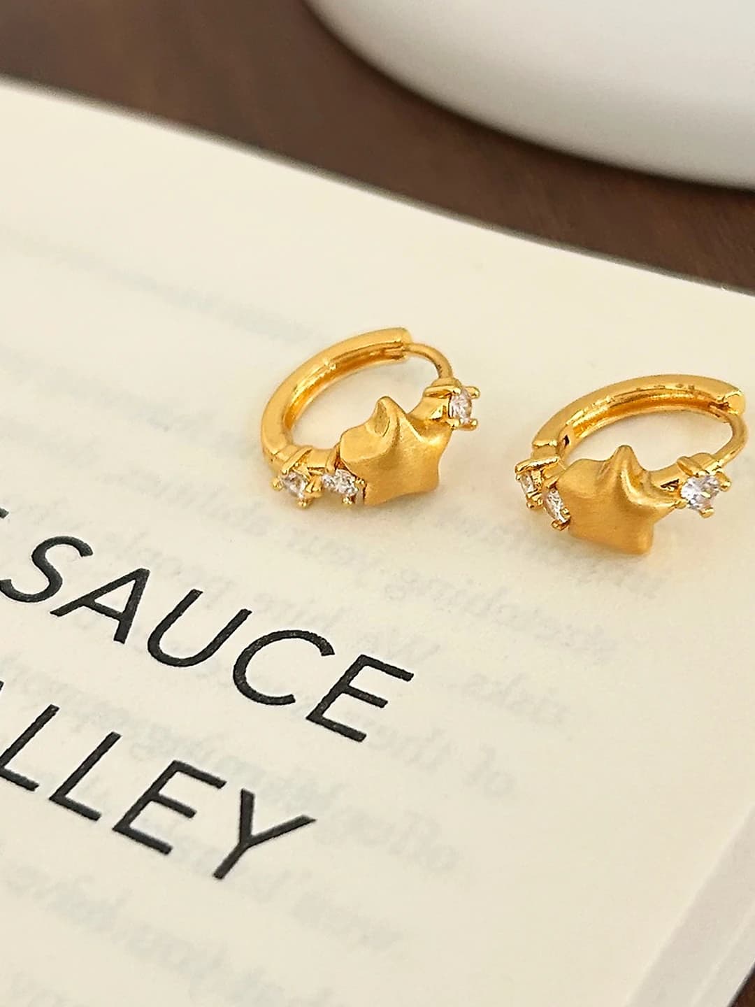 Gold matte star studs