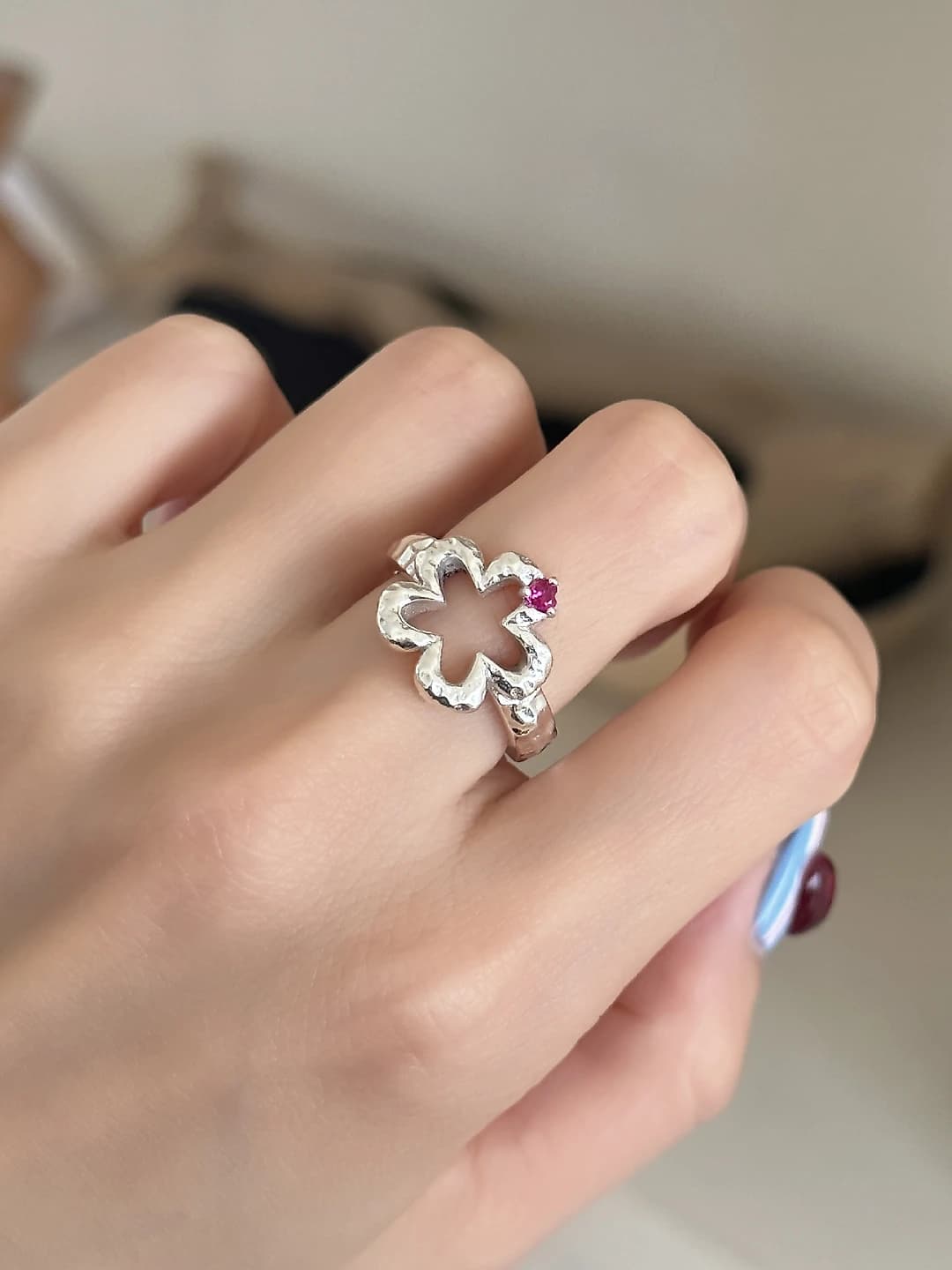 Women's geometric open ring with chain and tassel details