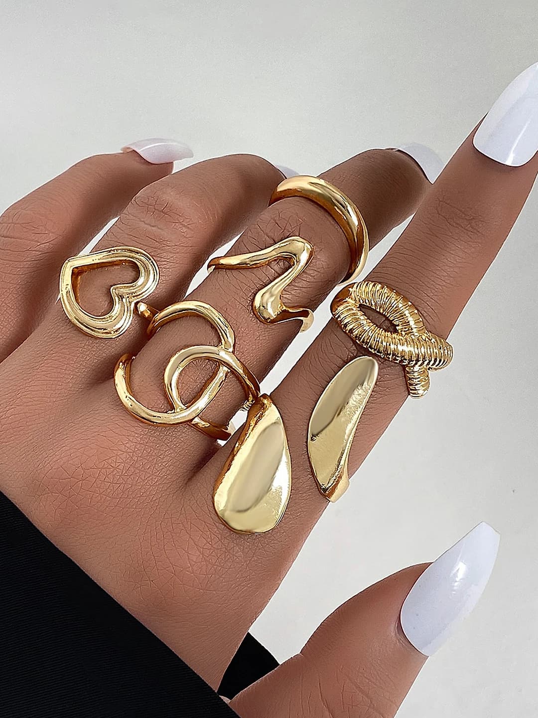 Women's set of 6 metallic geometric open rings with glossy finish and cutout design