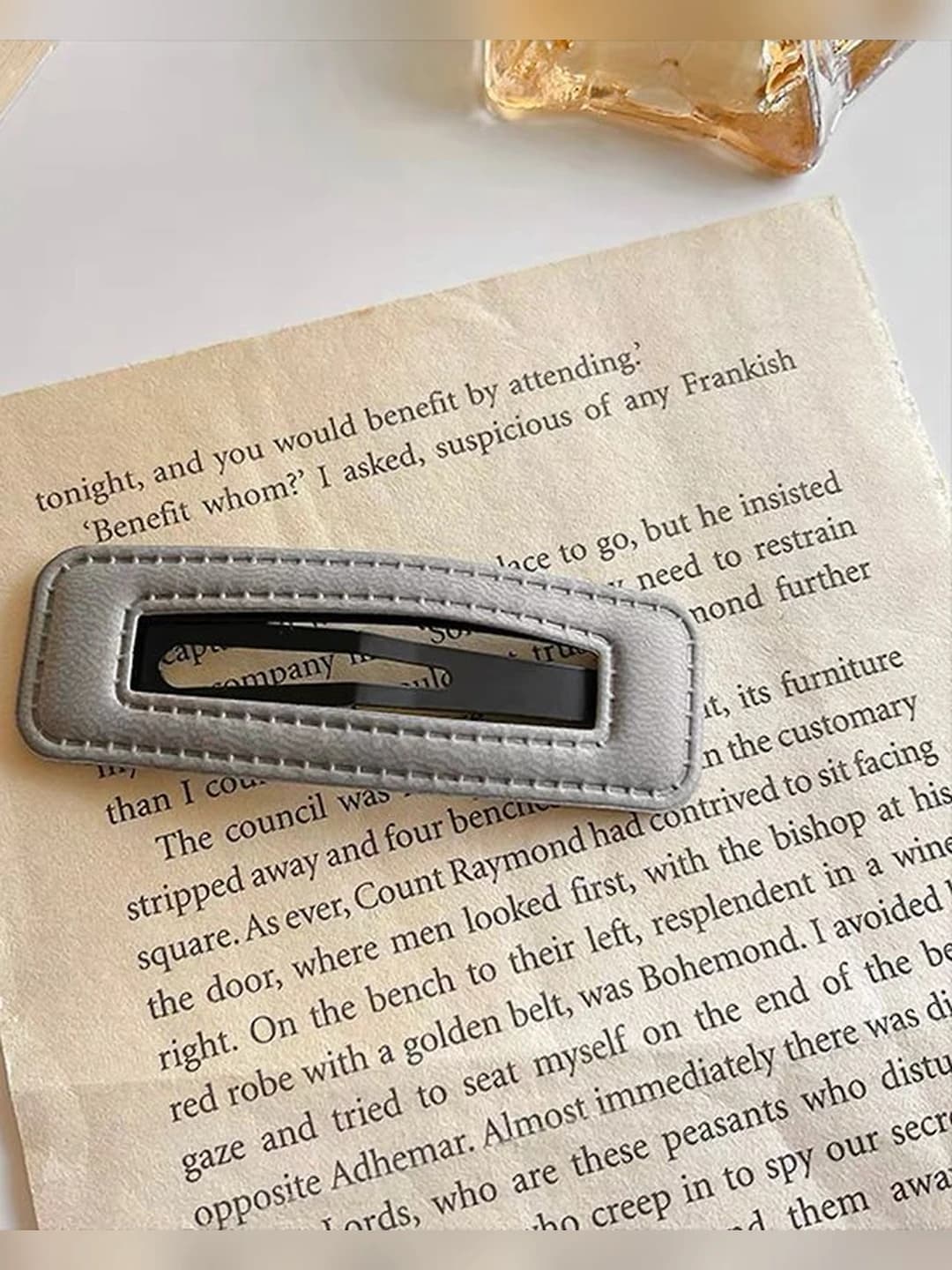 Grey flyaway hair clip