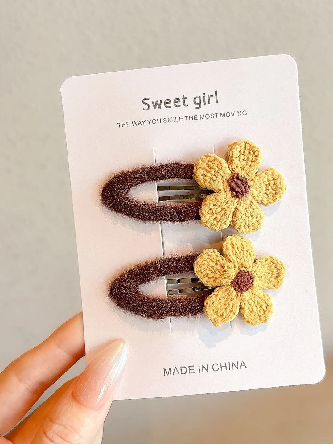 Yellow knitted floral clip, ~6 cm