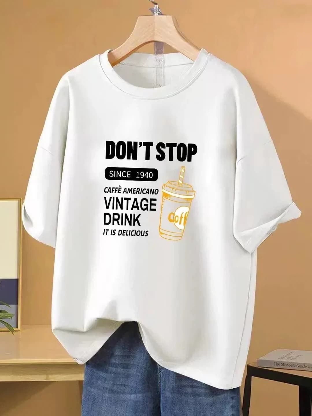 Women's summer mid-length t-shirt with crew neck, short sleeve, loose fit and printed pattern