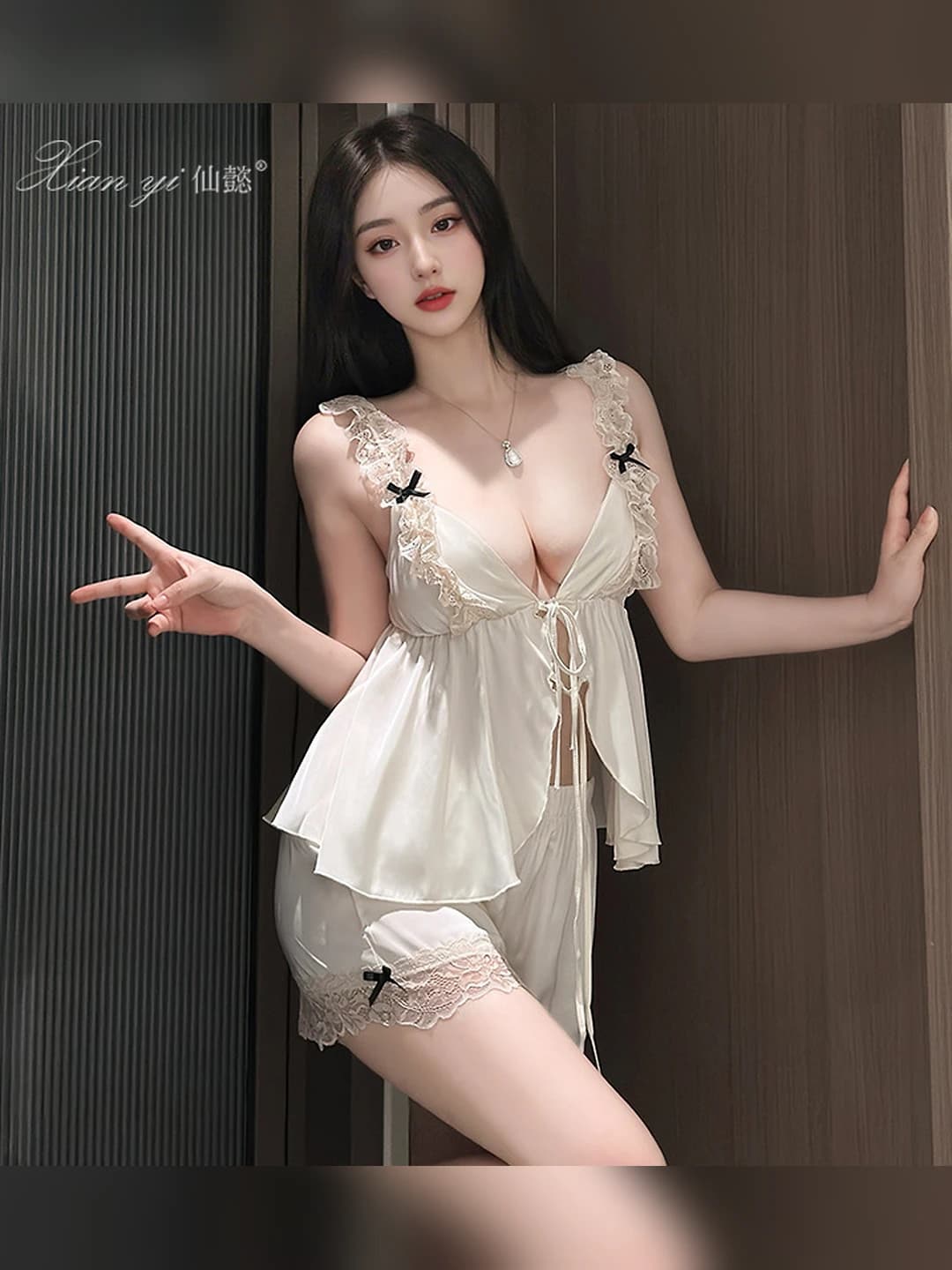 Women's sexy lingerie set with deep V-neck, straps and lace shorts