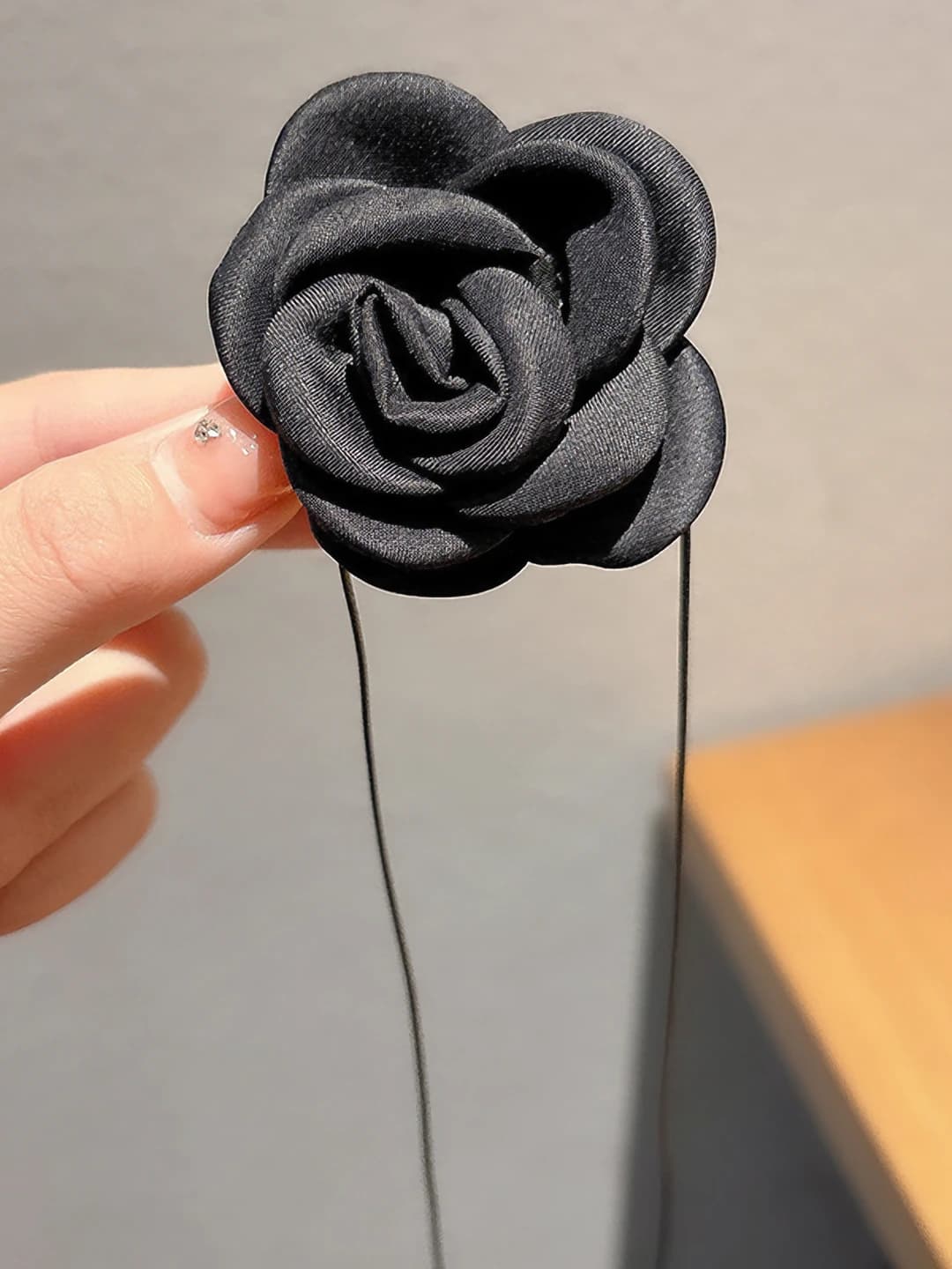 Black fabric flower