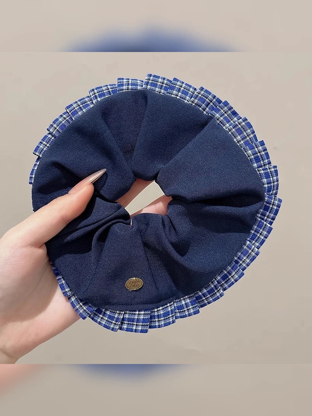 Blue scrunchie, plaid edge