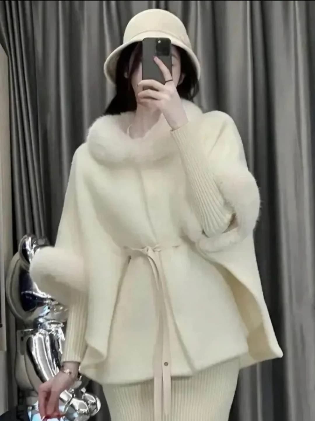 Women's warm solid colour poncho (cape) with belt and faux mink fur collar for autumn-winter