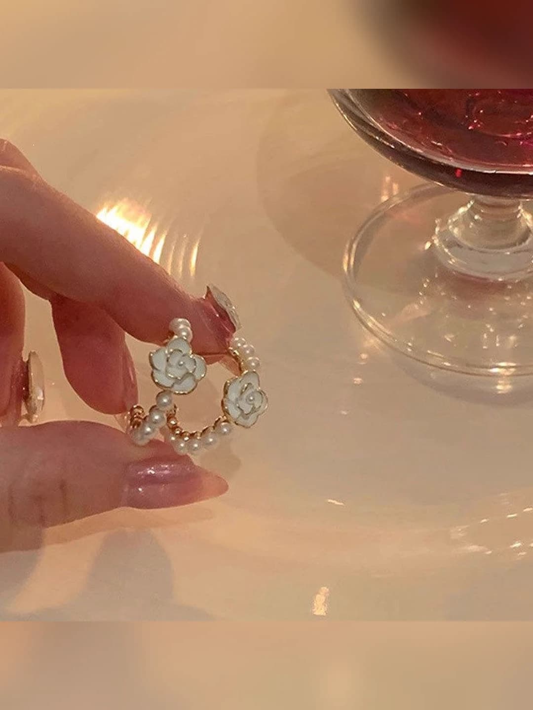 1# Drop camellia pearl C ring