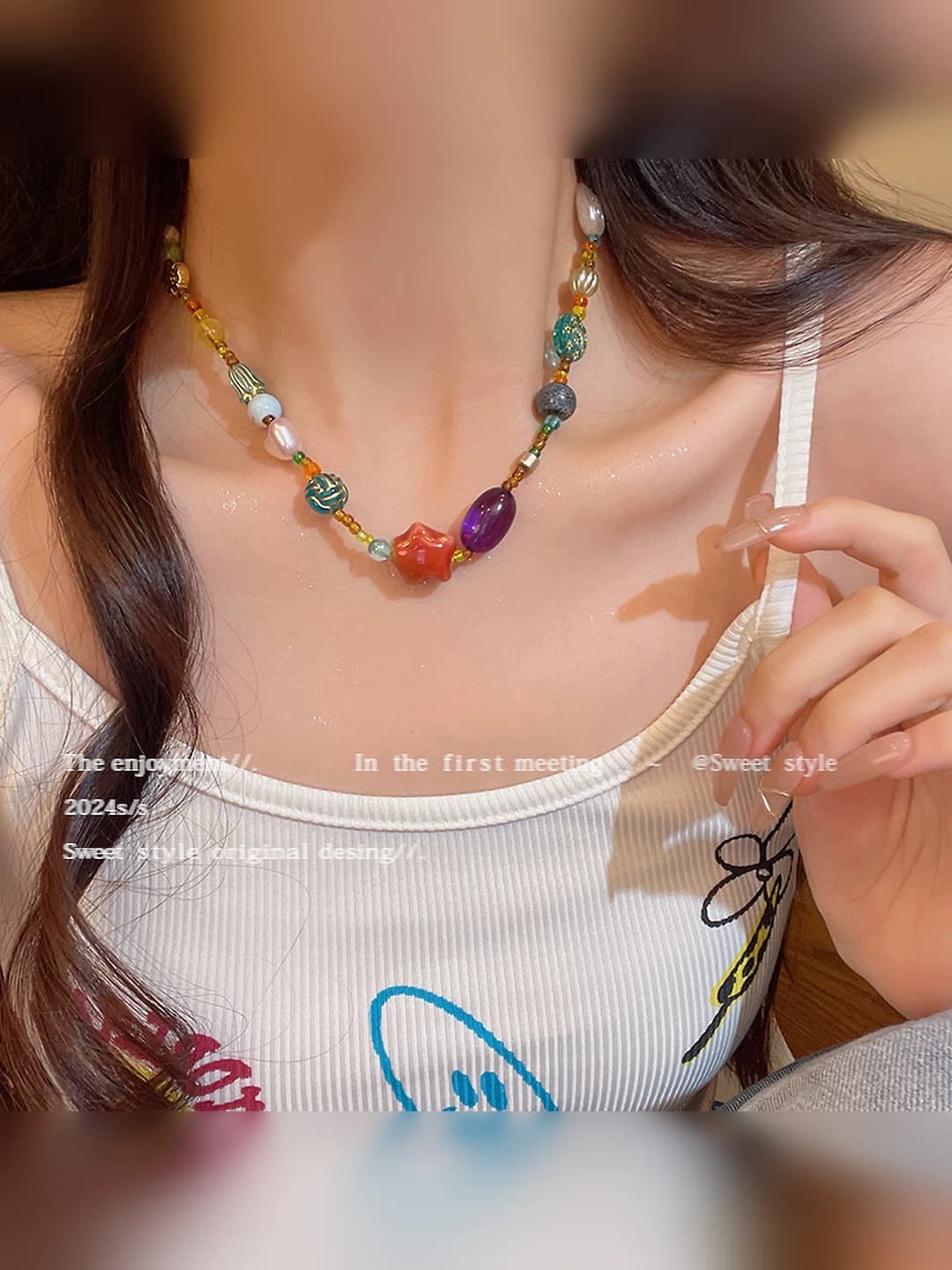 Women's colorful ceramic beaded necklace with star design element, minimalist style