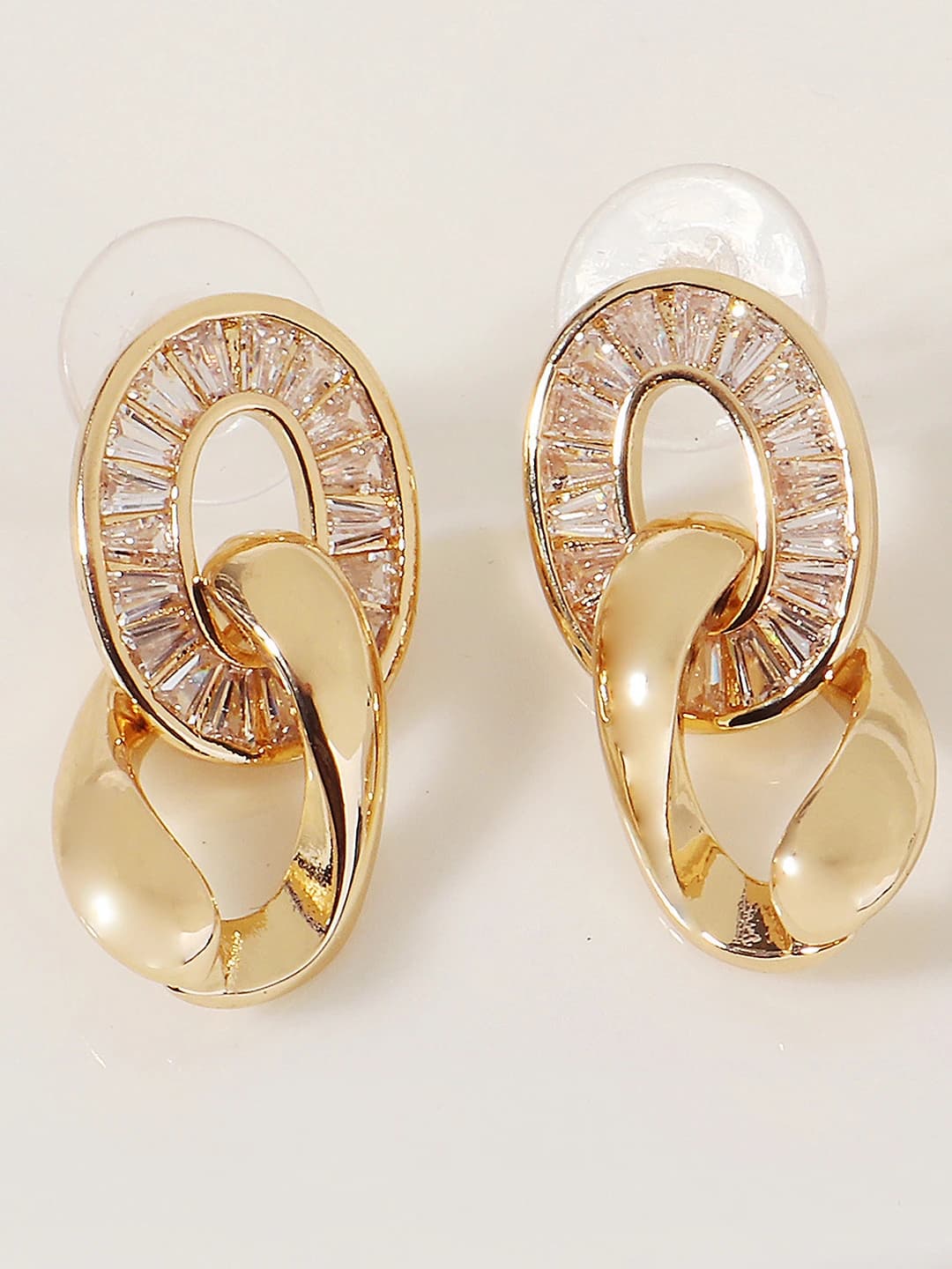 Gold commute earrings