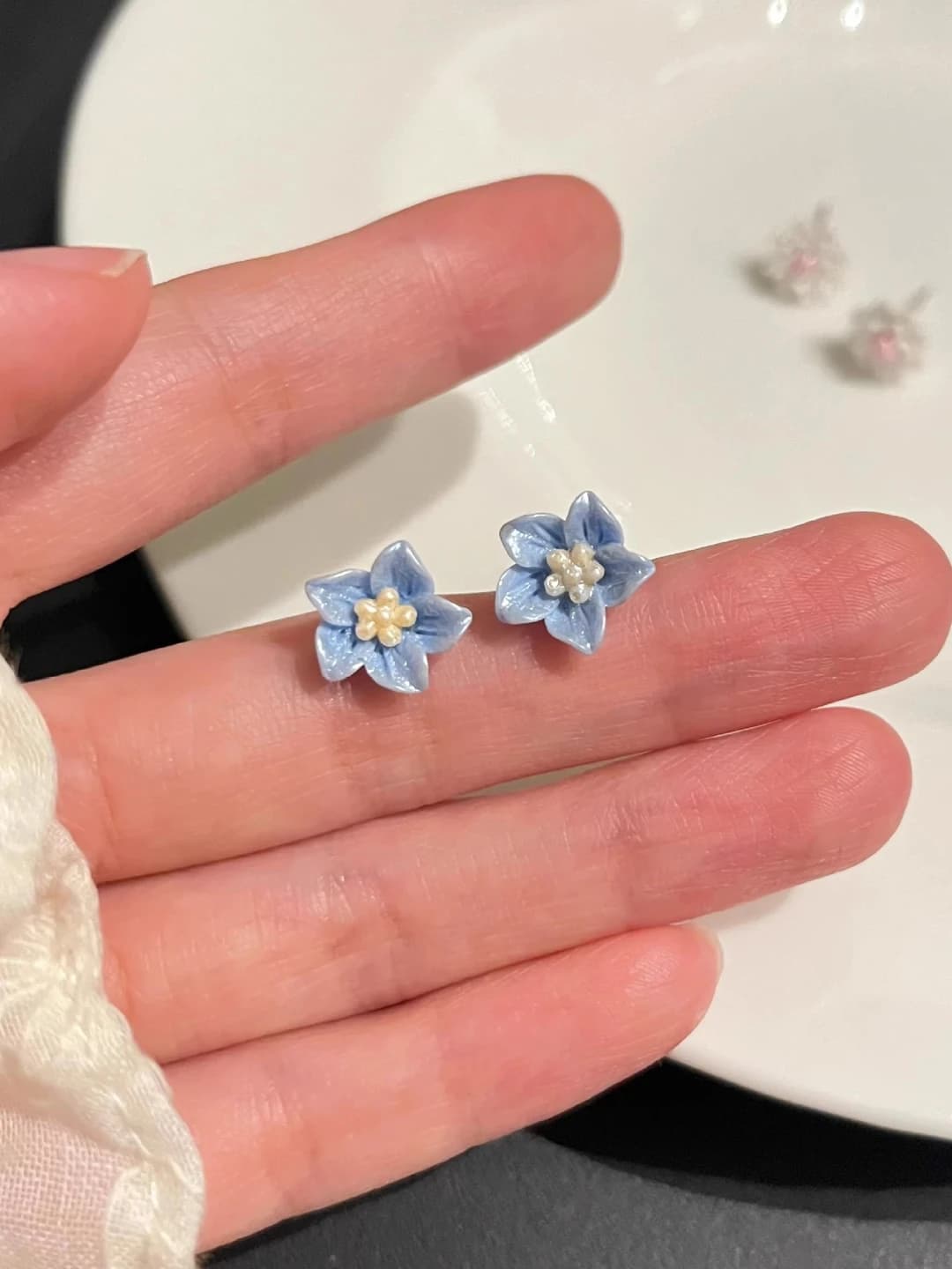 Blue small floral stud