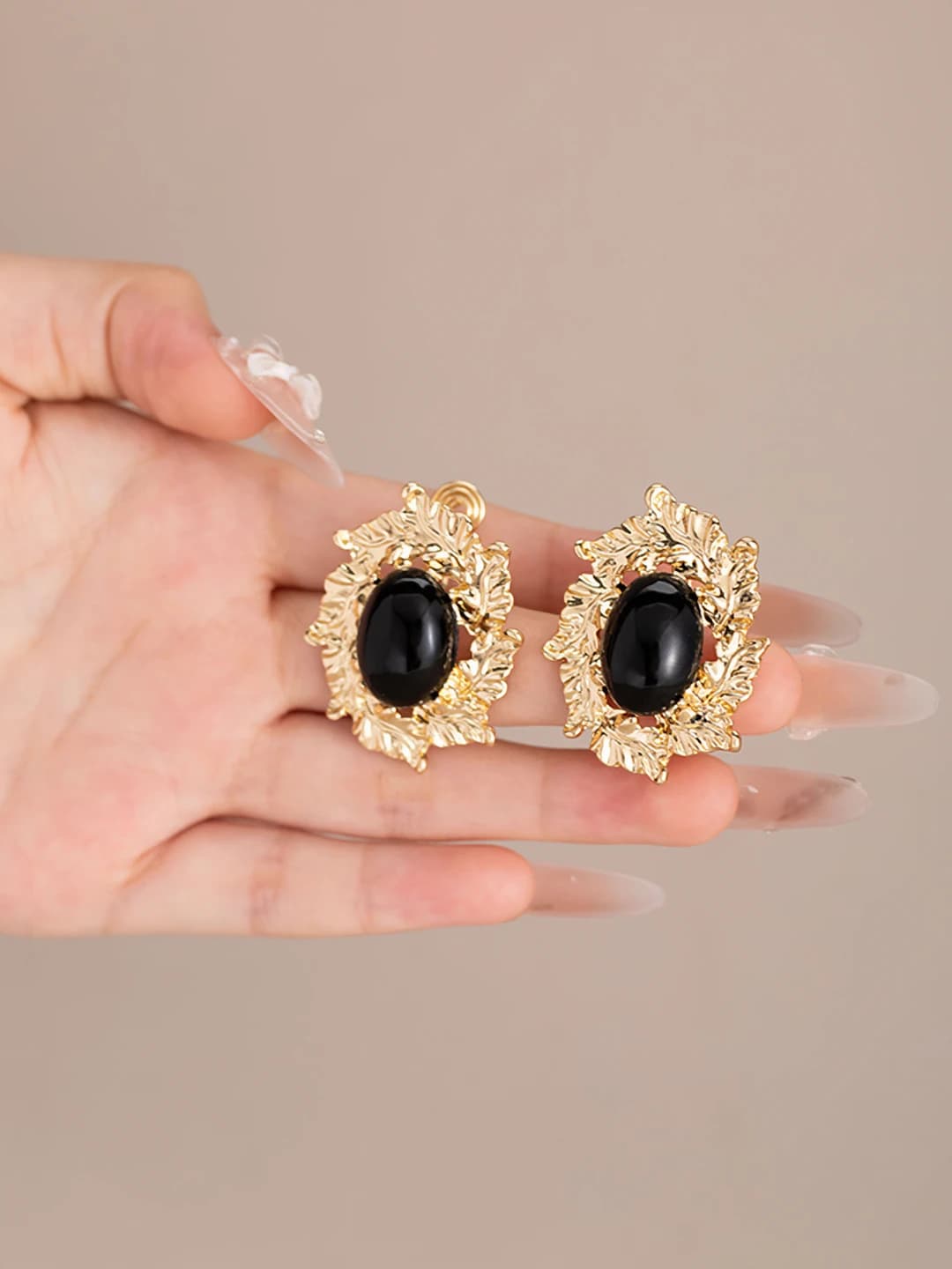 Black oval metal earring
