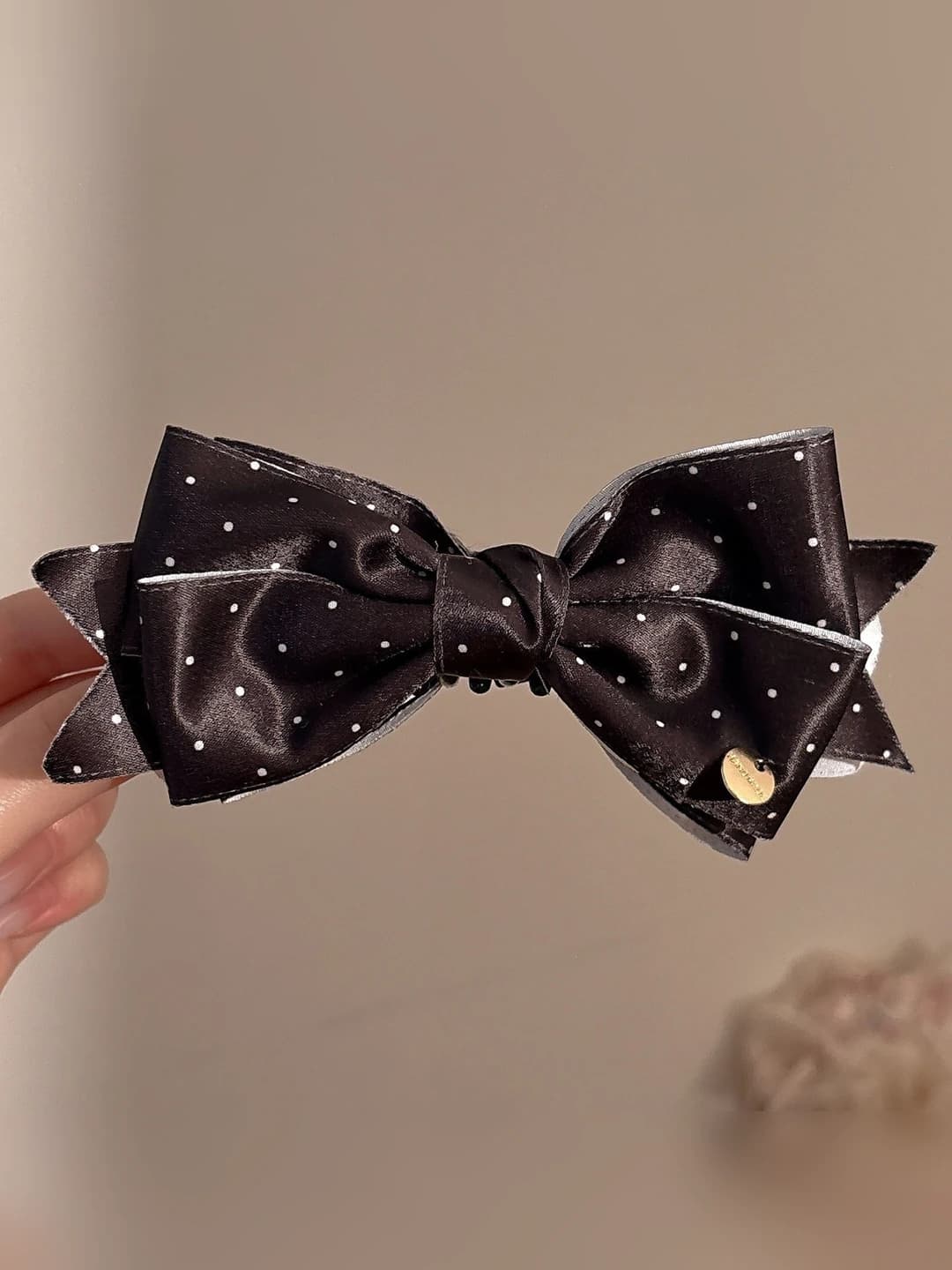 3# Black polka dot banana clip ~10 cm