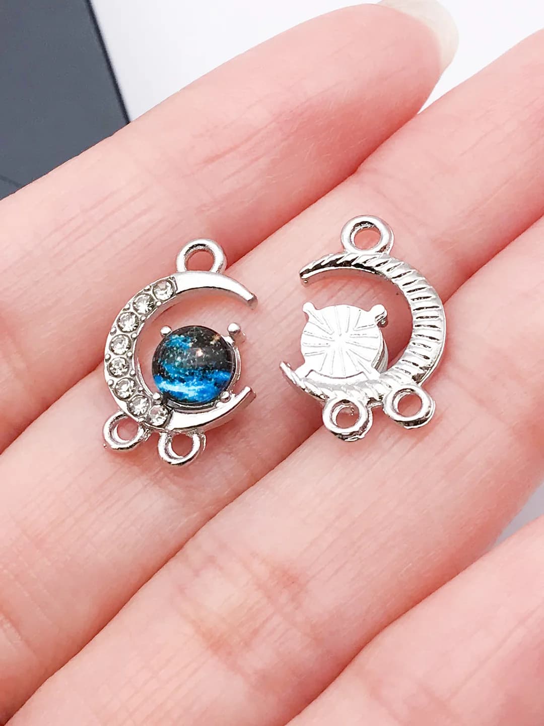 White K, blue rhinestone 3-hole moon 17x11x4mm