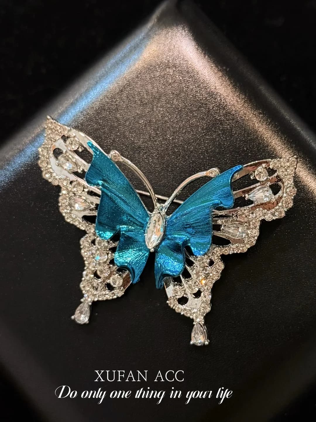 Blue butterfly brooch