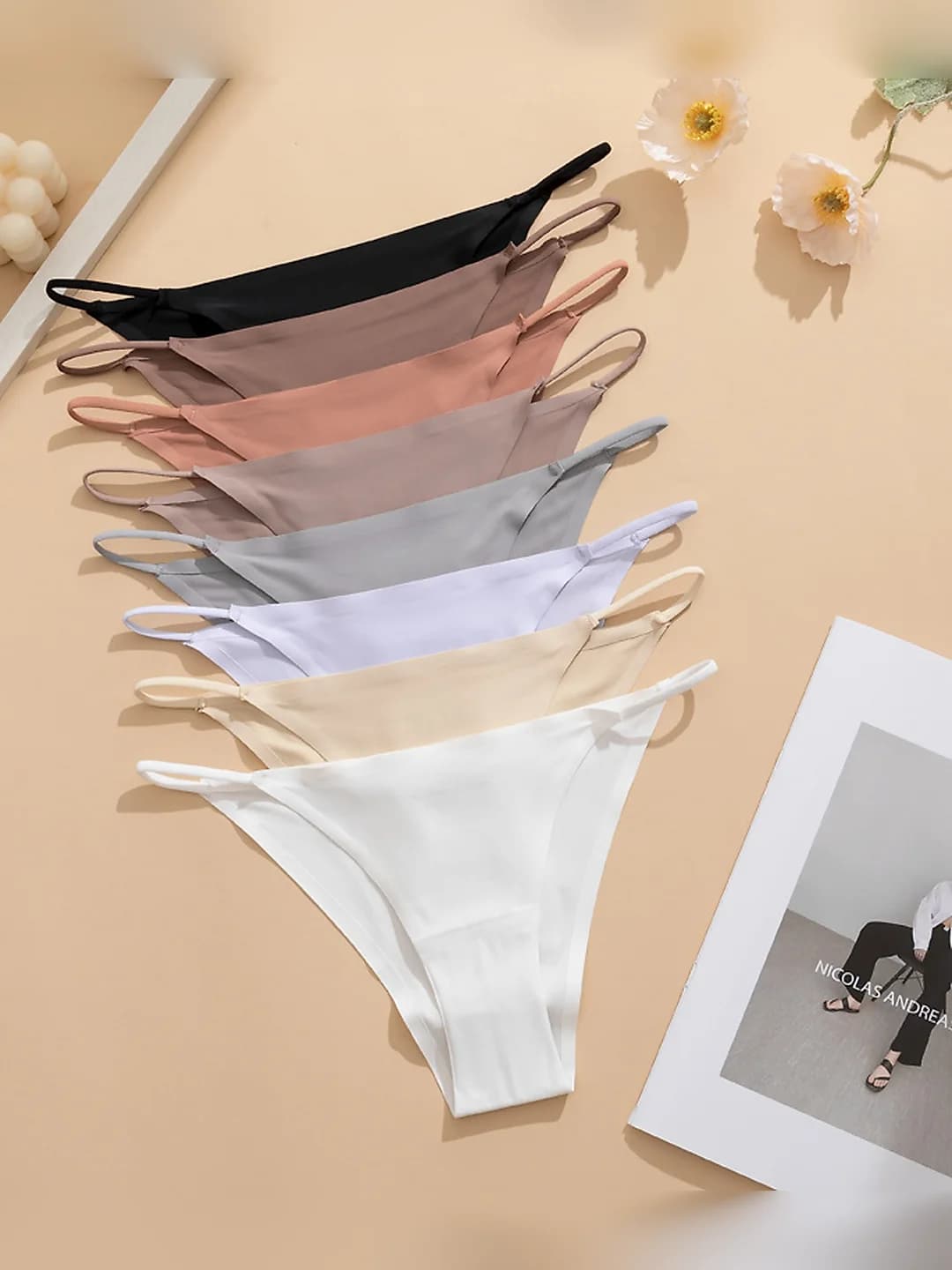 Women's plus-size seamless briefs in ice-silk fabric, low waist, thin, breathable, thin-strap thong style, bikini style, individually packed